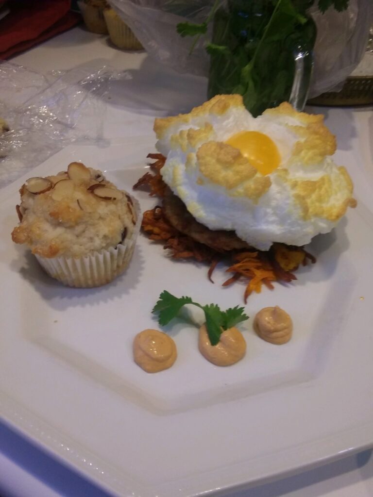 Sweet potato hash with cloud egg and cherry almond muffin